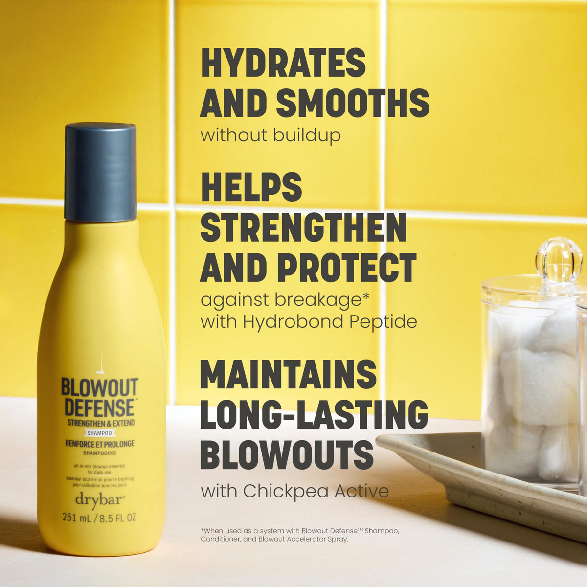 Drybar Blowout Defense Shampoo foamy lather coats hair for detangling and hydration.