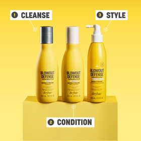 Drybar Blowout Defense Shampoo heat protection visual emphasizes styling durability.