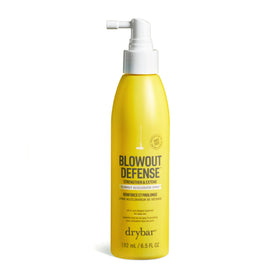 Drybar Blowout Defense bottle top view demonstrates fast-drying formula.