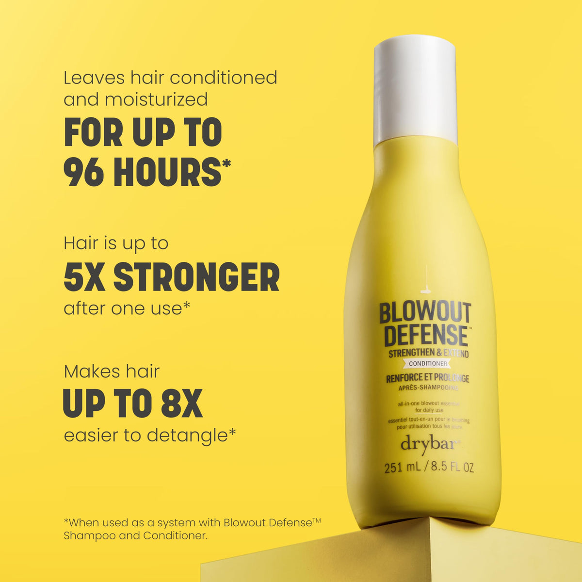 Drybar conditioner bottle dispensing product for detangling and hydration.