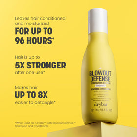 Drybar conditioner bottle dispensing product for detangling and hydration.