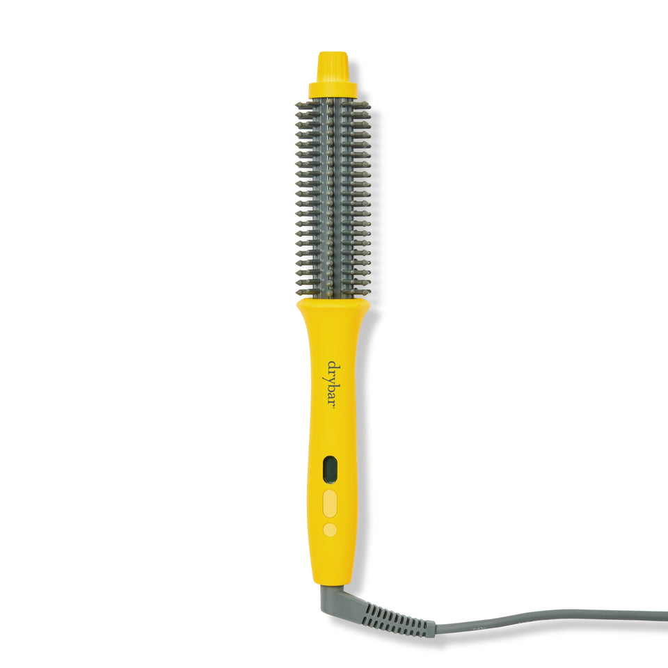 Drybar Curl Party brush handle close-up for comfortable grip and precise styling.