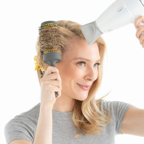 Hair-on-brush shot showing bristle design for tension and control
