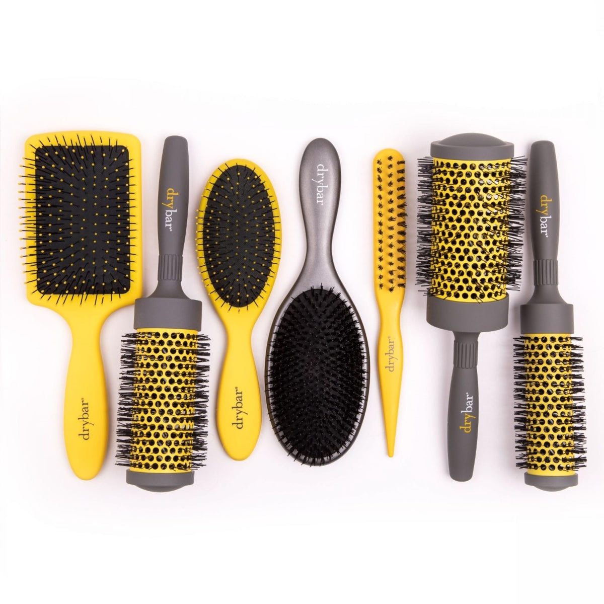 Drybar Double Pint brush in use during a blowout for curl and even heat