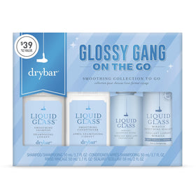 Drybar Liquid Glass smoothing shampoo travel-size bottle ready for on-the-go cleansing.
