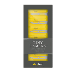 Drybar Tiny Tamers clip securing hair as it sets without tugging