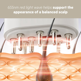 DS Laboratories Scalp Activator light closeup highlighting gentle scalp therapy.