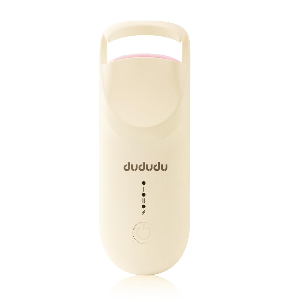 DUDUDU heated eyelash curler in hand showing precise gentle curling