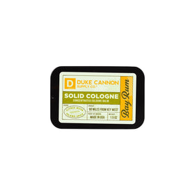 Duke Cannon Bay Rum solid cologne texture showing balm smoothness.
