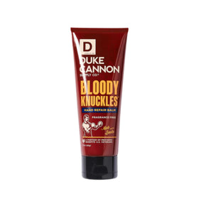 Duke Cannon Bloody Knuckles balm applied to dry cracked hands for moisture.