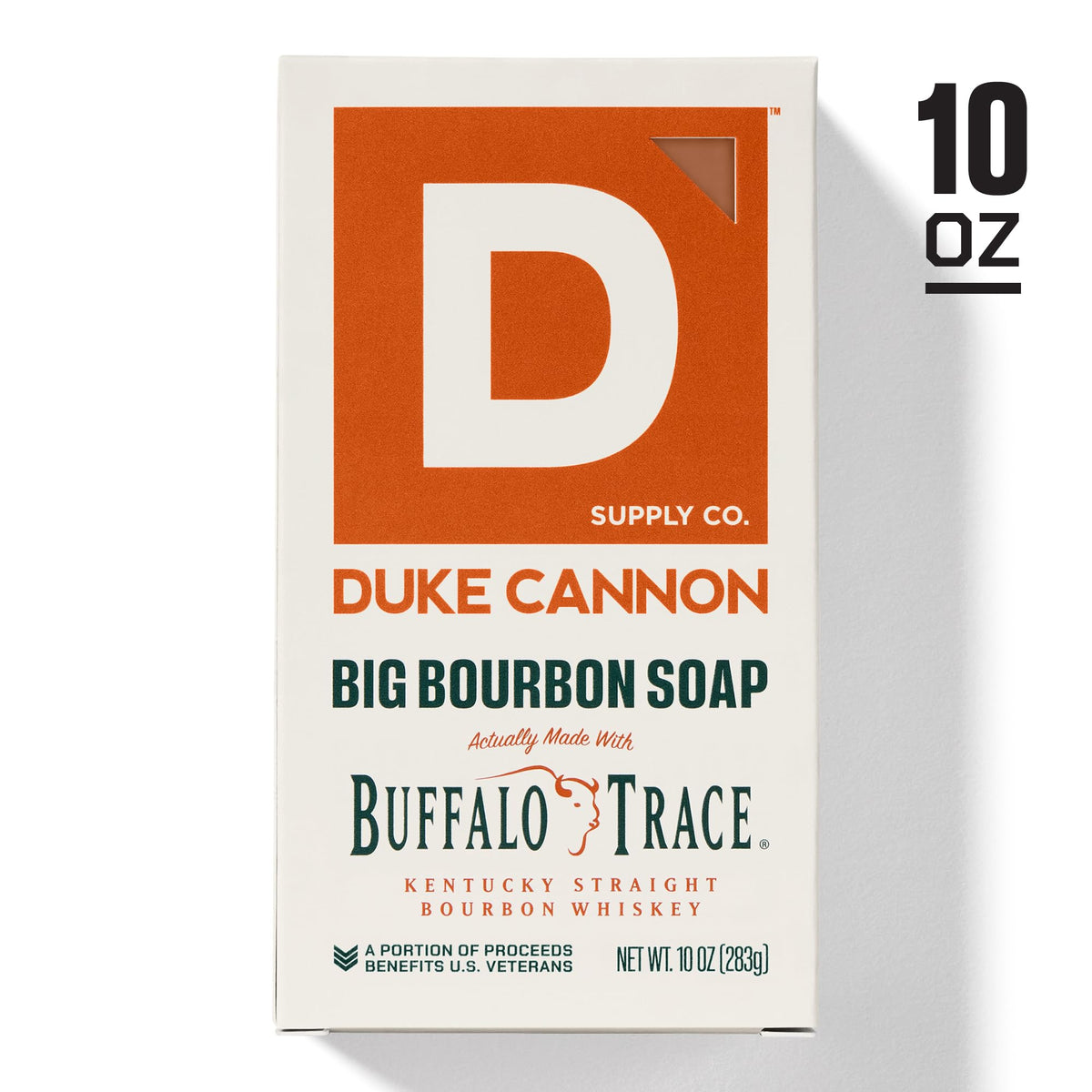Duke Cannon Bourbon Soap on oak surface evokes bourbon fragrance.