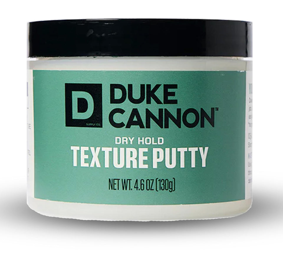 Duke Cannon Dry Hold Texture Putty bottle shows a matte finish for versatile styling.