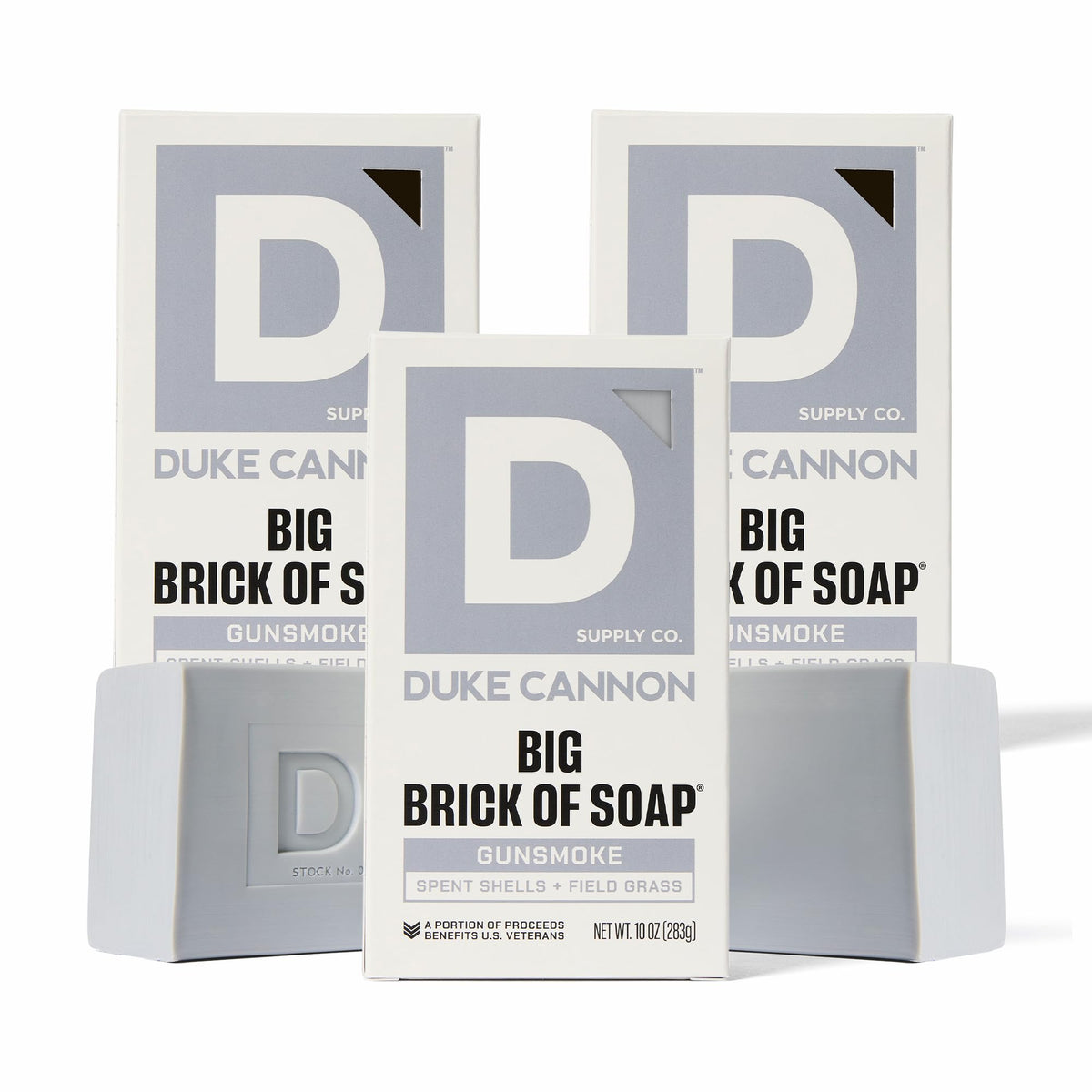 Duke Cannon Gun Smoke soap bar wood scent for rugged cleansing and freshness.
