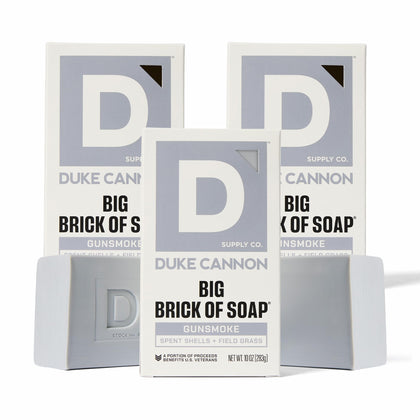 Duke Cannon Gun Smoke soap bar wood scent for rugged cleansing and freshness.
