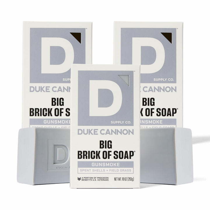 Duke Cannon Gun Smoke soap bar wood scent for rugged cleansing and freshness.