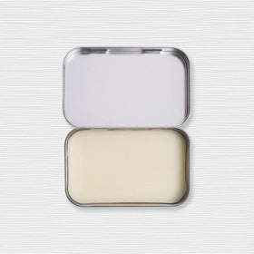 Duke Cannon Old Glory solid cologne on wrist demonstrates discrete scent upgrade.