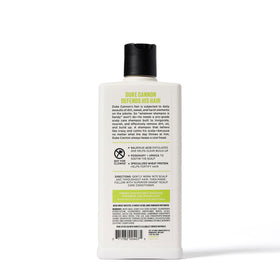 Duke Cannon shampoo lather in hand showing exfoliating scalp cleanse.