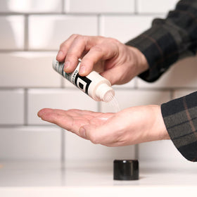 Duke Cannon Styling Powder blends into hair for natural texture and volume.