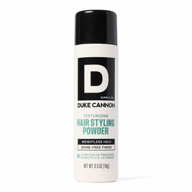 Duke Cannon Styling Powder bottle front view highlights compact, travel-friendly packaging.