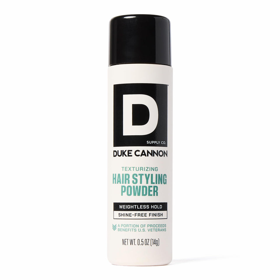 Duke Cannon Styling Powder bottle front view highlights compact, travel-friendly packaging.