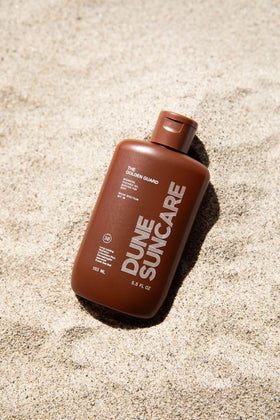 DUNE Suncare Golden Guard watermelon oil ingredient close-up for skin nourishment.