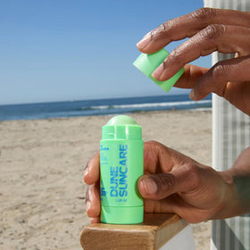 DUNE SUNCARE Slip Stick environmental shield against pollution.