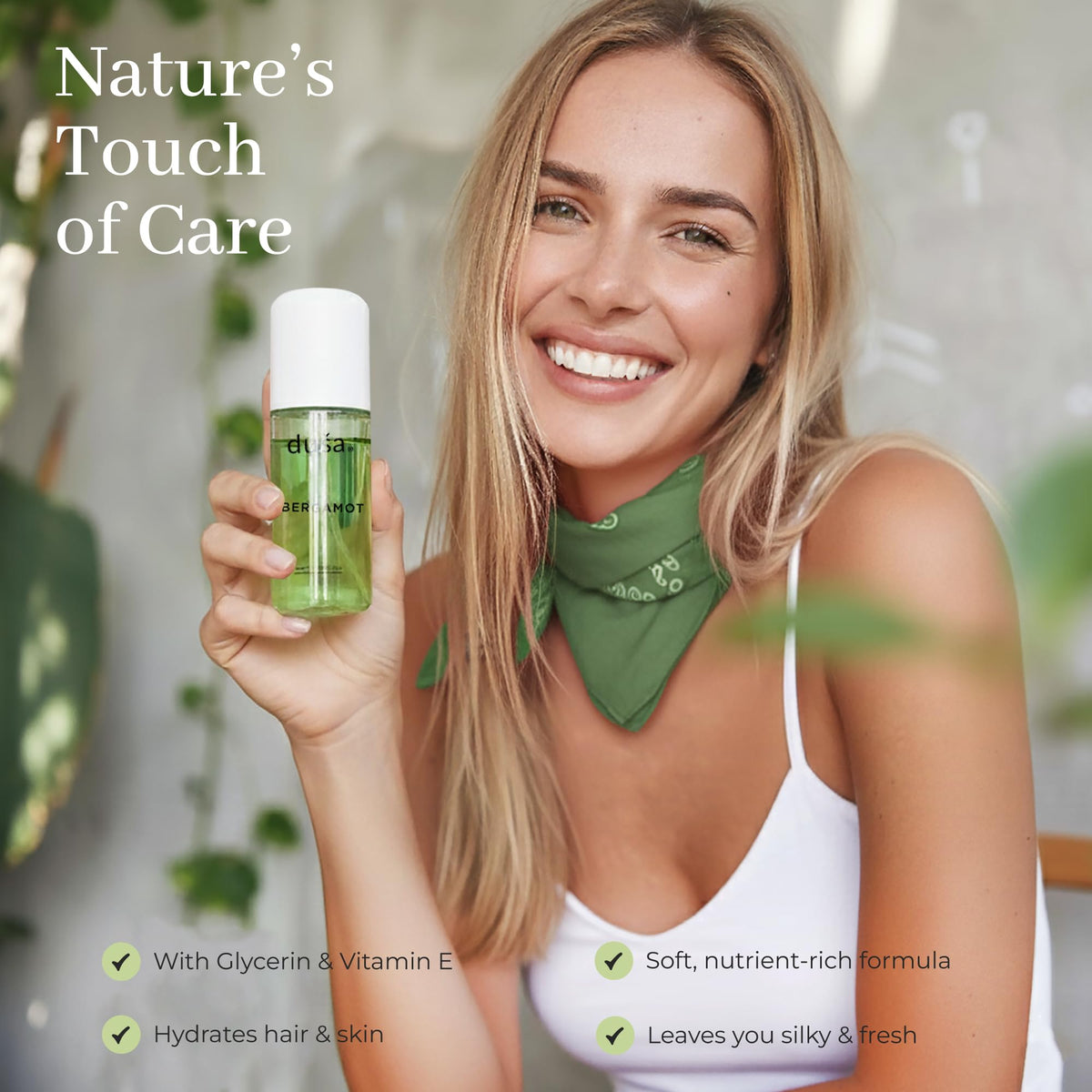 DUSA Bergamot Nourishing Oil droplets near hair ends.