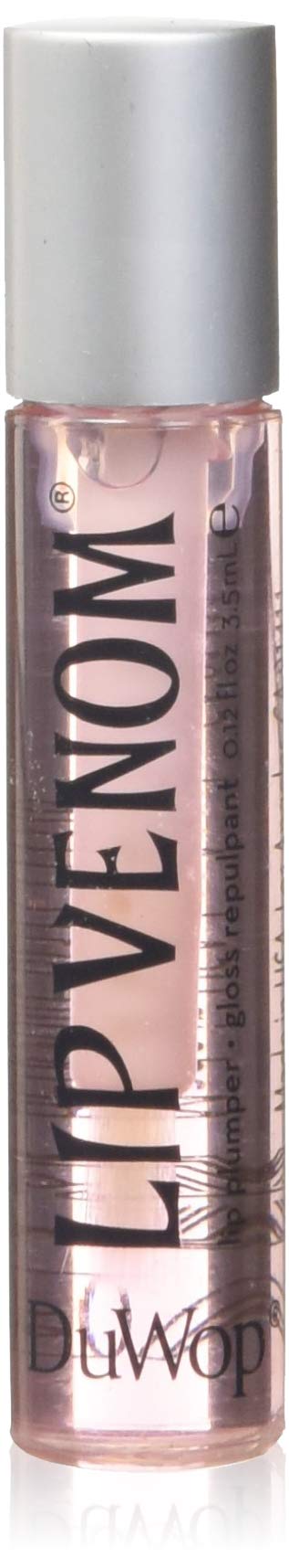 DuWop Lip Venom Pink tube applying gloss for a fuller, glossy pout.