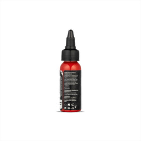 Dynamic Color Co Platinum Pure Red bottle cap close-up highlighting premium branding.