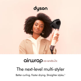 Six intelligent attachments enable versatile 6-in-1 styling for curly to coily hair.