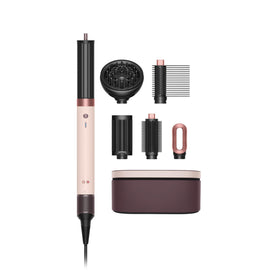 Dyson Airwrap Co-anda2x in ceramic pink and rose gold for powerful all-in-one styling.