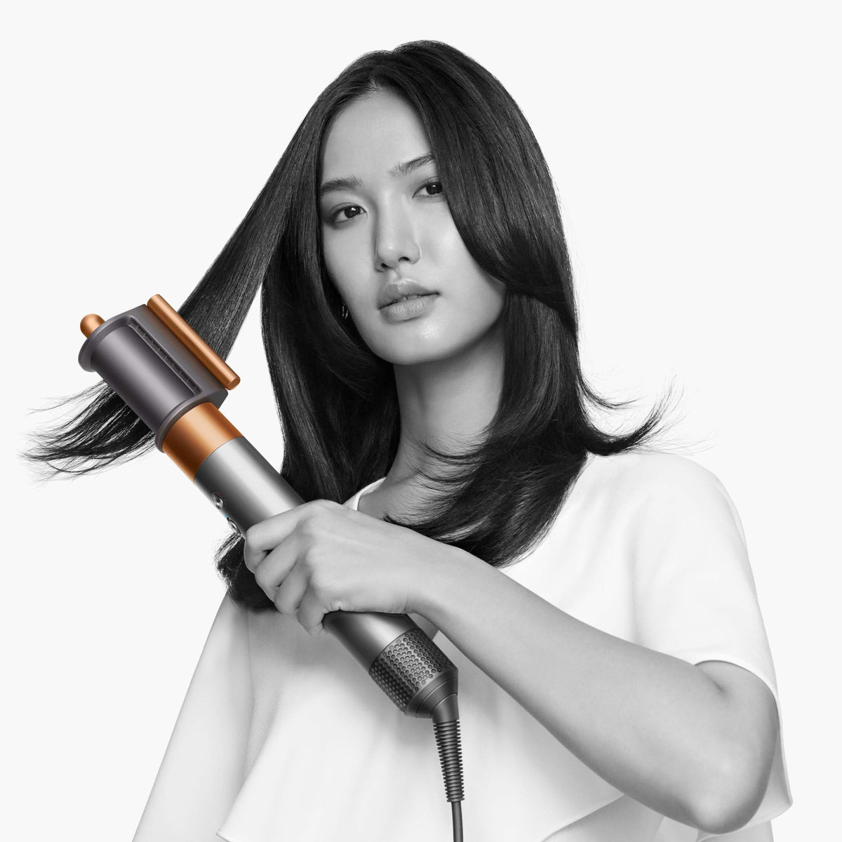 Dyson Airwrap Origin 12-inch barrel creates voluminous curls in both directions.