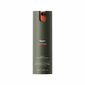 Dyson Amino leave-in bubble bottle pour for easy, balanced scalp care.