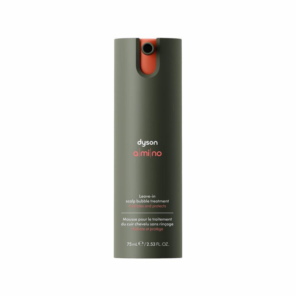 Dyson Amino leave-in bubble bottle pour for easy, balanced scalp care.