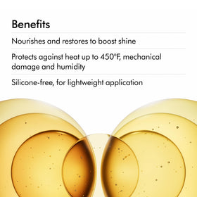 Dyson Omega Hydrating Hair Oil on hand shows lightweight texture for quick nourishment.
