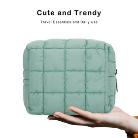 Durable cotton-padded exterior with reliable zipper keeps items secure.