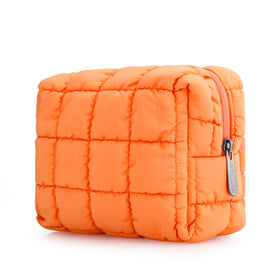E-Tree makeup bag with quilted design in orange for stylish daily carry.