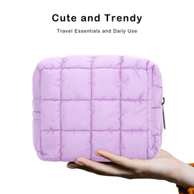 E-Tree purple makeup bag open zipper for quick touch-ups on the go.