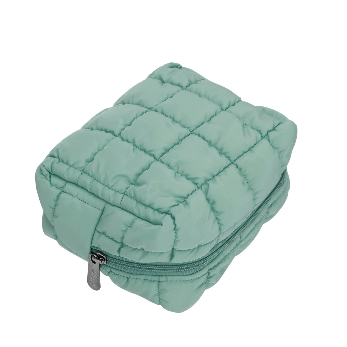 Green checkered travel case keeps toiletries neatly in one place.