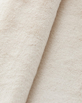 Soft-touch finish complements vanity setups while traveling
