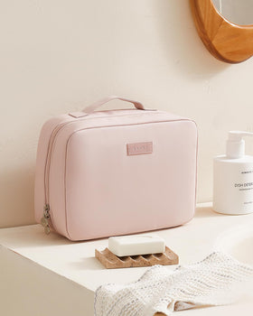 Eachy pink design adds style while keeping travel essentials organized.