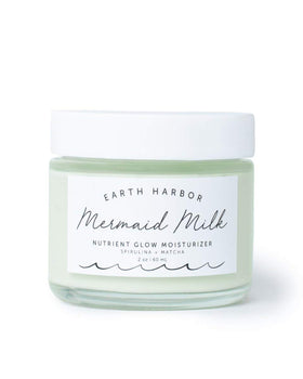 Earth Harbor Mermaid Milk moisturizer jar close-up showing lightweight hydration for daily use.