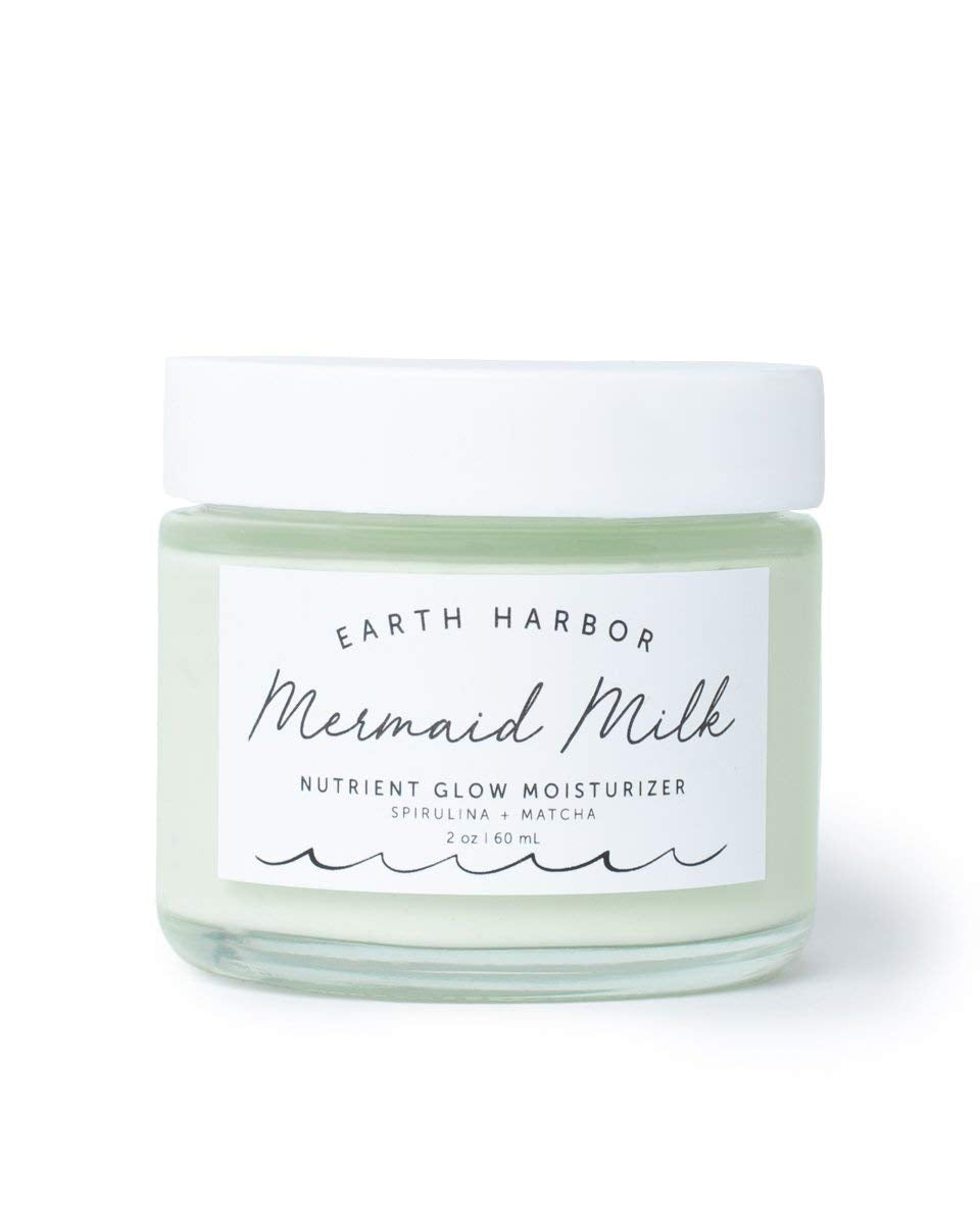 Earth Harbor Mermaid Milk moisturizer jar close-up showing lightweight hydration for daily use.