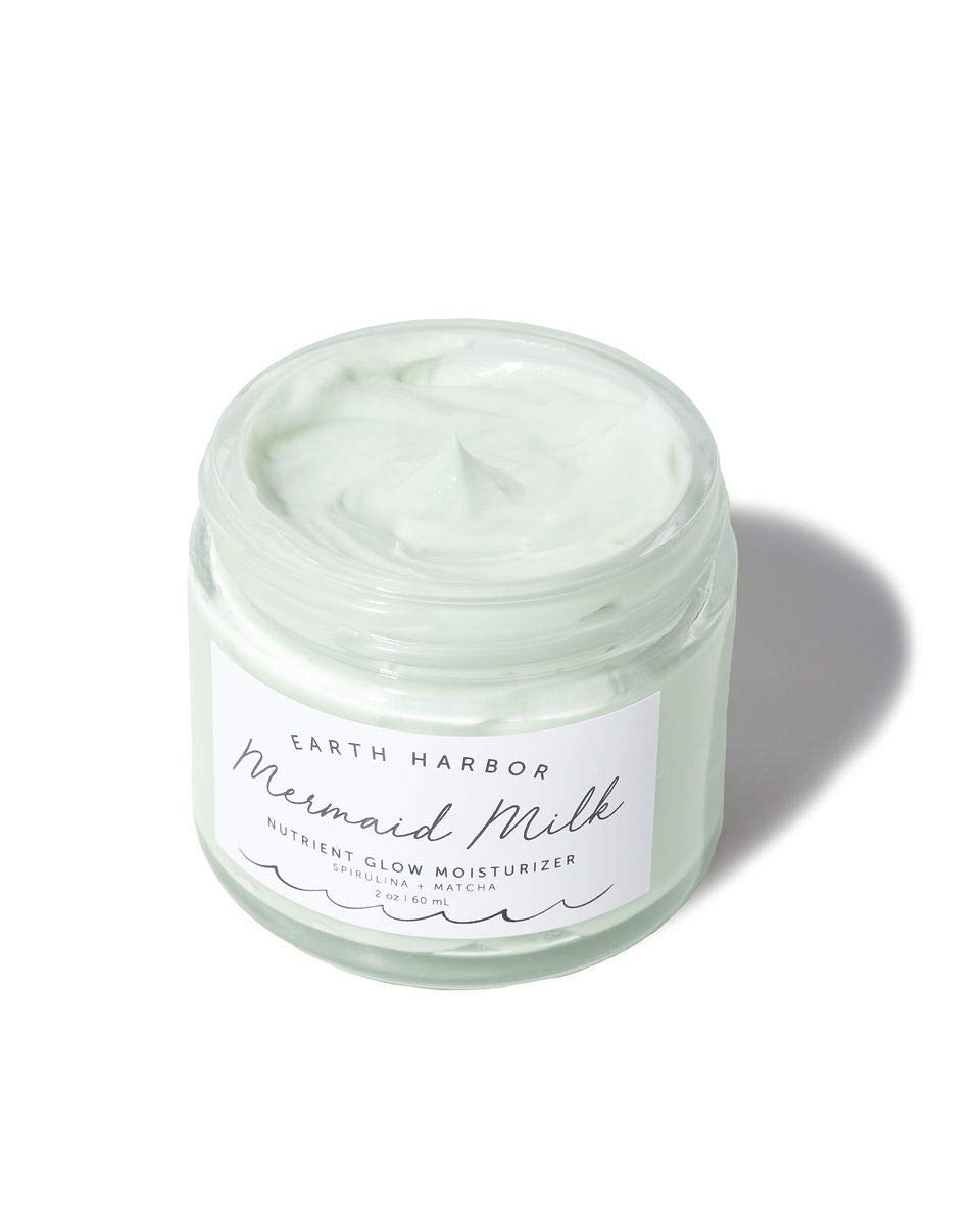 Earth Harbor Mermaid Milk swirls on skin illustrate smooth, non-greasy hydration.