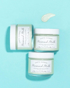 Earth Harbor Mermaid Milk applied to skin showing even application and absorption.