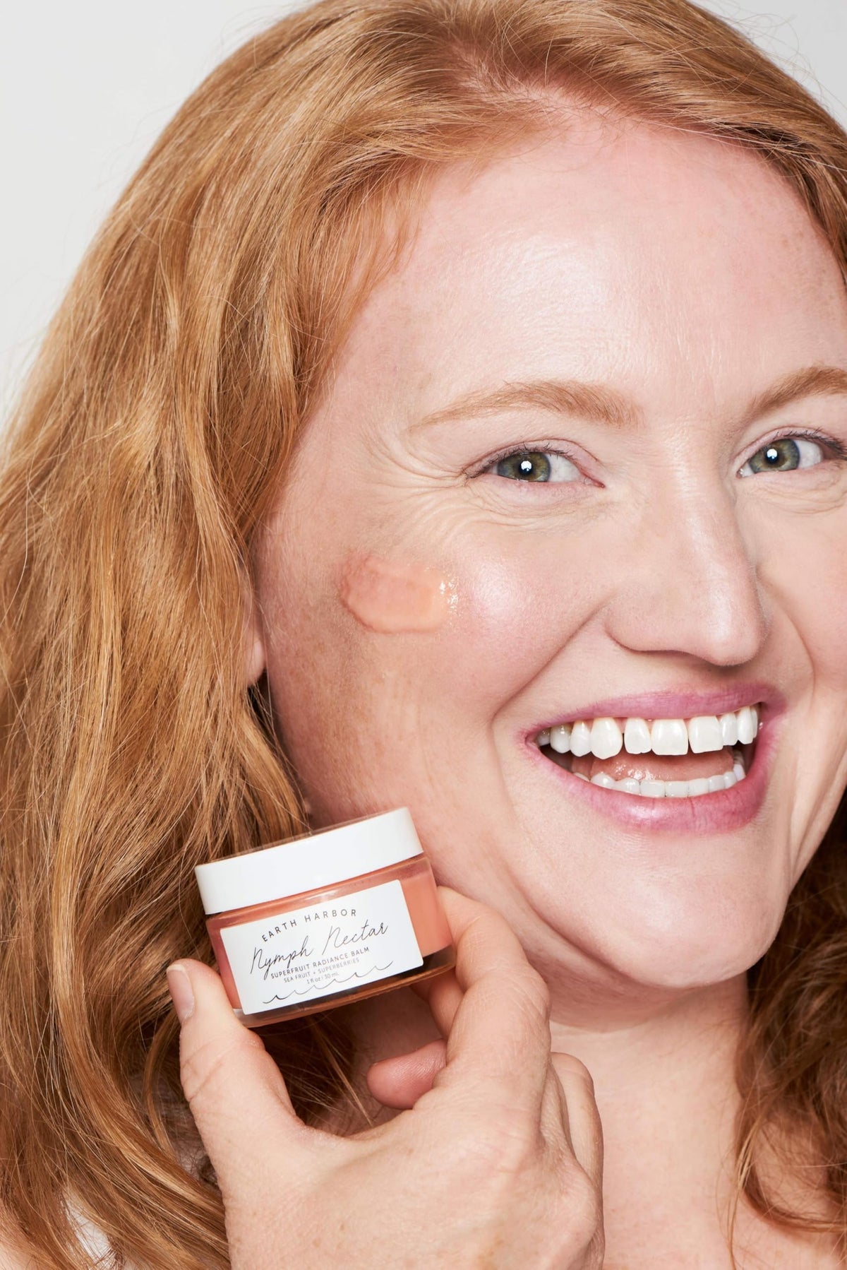 Earth Harbor NYMPH NECTAR glaze finish signals weightless moisture on skin.
