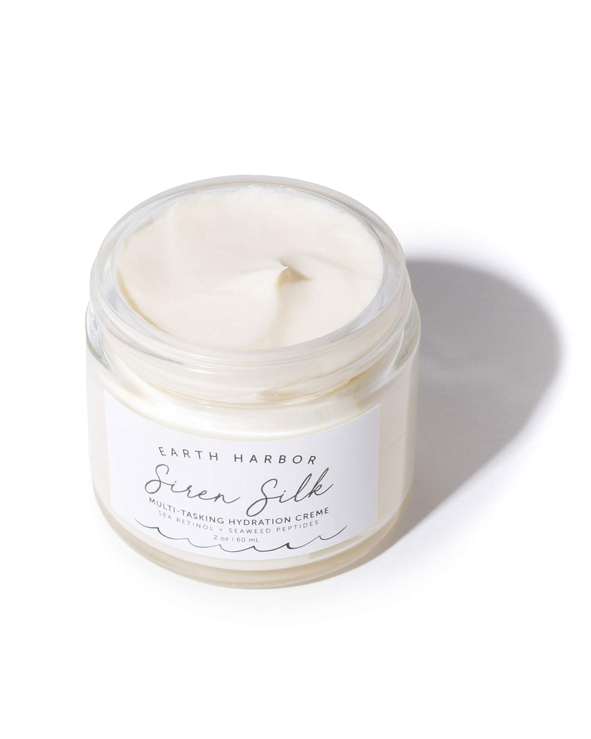 Cream swirl of Earth Harbor SIREN SILK highlighting creamy overnight hydration