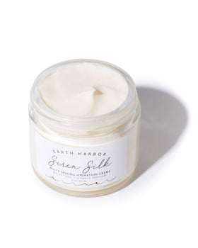 Cream swirl of Earth Harbor SIREN SILK highlighting creamy overnight hydration
