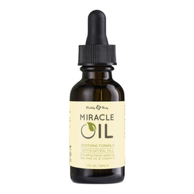 Earthly Body Miracle Oil bottle closeup highlighting natural blend for moisturizing and soothing skin.