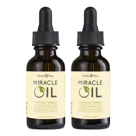 Earthly Body Miracle Oil bottle pour for hydration and smooth skin